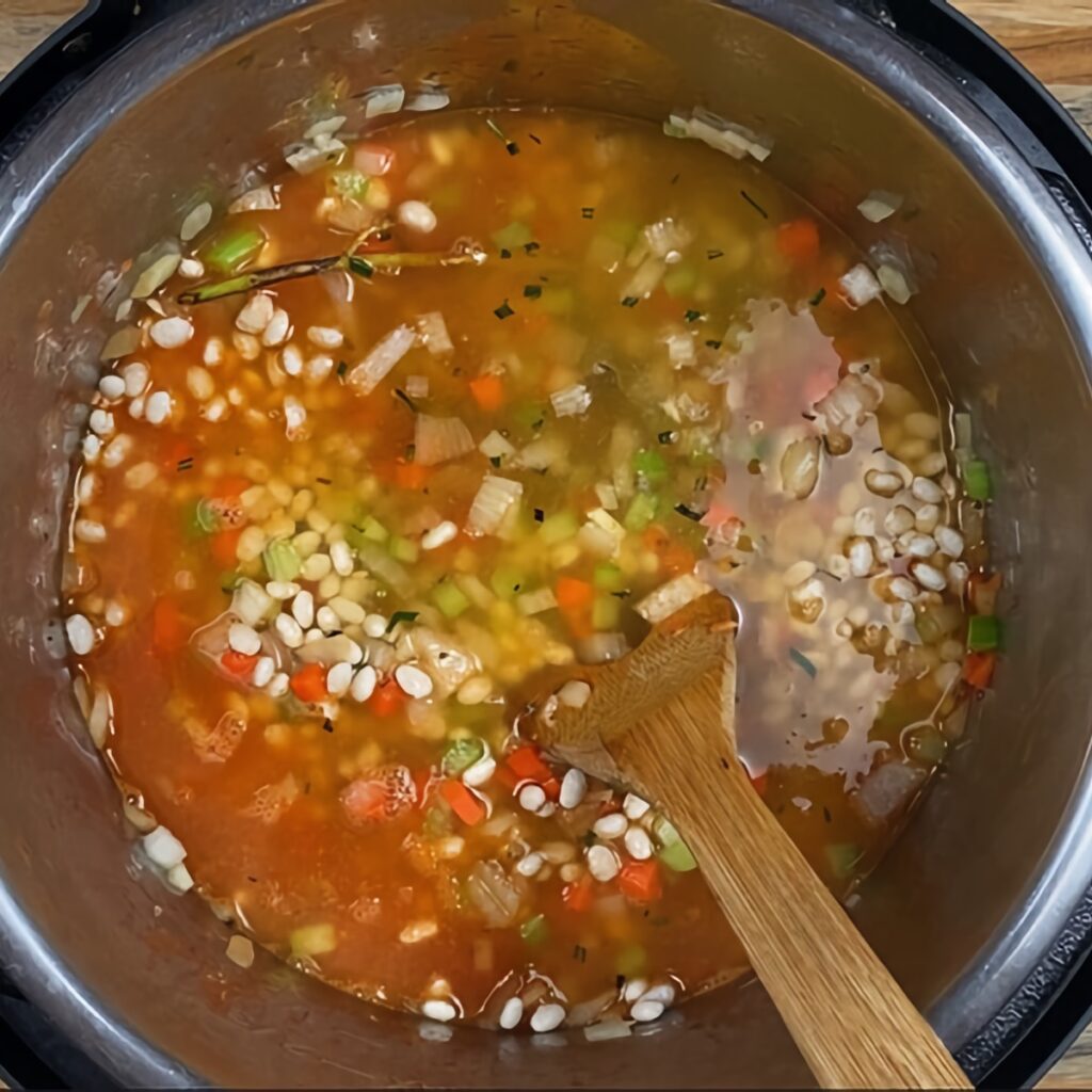 Instant Pot Ham and Bean Soup: add stock and water.