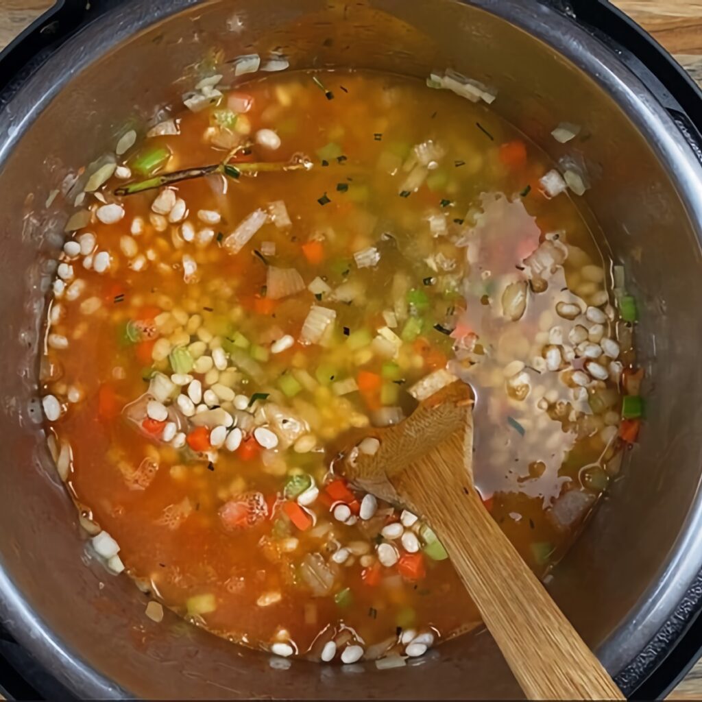 Instant Pot Ham and Bean Soup: add stock and water.