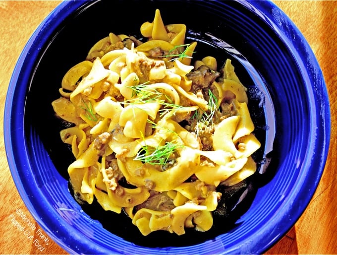 Easy One-Pot Meal Recipes: One-Pot Ground Beef Stroganoff serving in a blue bowl. A fast, easy comfort food meal! #comfortfood #onepot #onepan #oneskillet #beefstroganoff #groundbeefstroganoff @FlippedOutFood