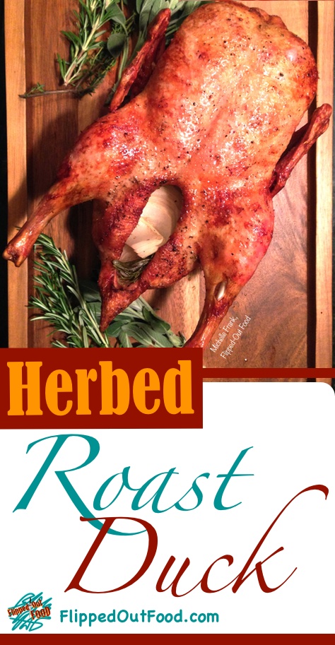 Herbed Roast Duck is perfect for holiday dinner parties. Perfumed with herbs and served with a tangy, aromatics-infused sauce.