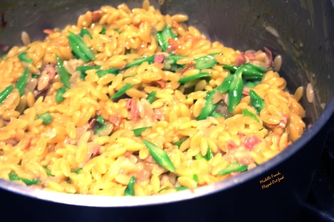 Asparagus orzotto with pancetta, nearly done in the Dutch oven