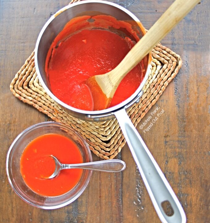 Easy Homemade Pizza Sauce in saucepan and a serving dish. Put the sauce on your homemade or store-bought pizza dough, French bread, naan, or pita bread with mozzarella and your favorite toppings for a fun, kid-friendly meal!