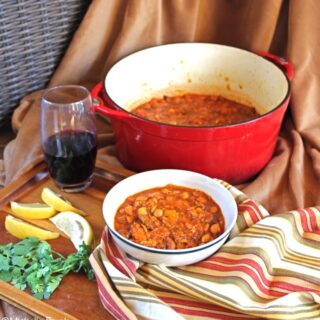 Moroccan Lamb Stew: loaded with flavor and easy to make on the stovetop or in the crockpot. Great over couscous or rice! #moroccanstew #moroccanlambstew #comfortfood #crockpot #slowcooker #flippedoutfood via @FlippedOutFood