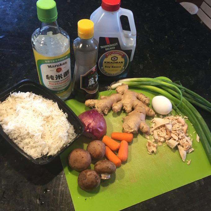 Leftover vegetable fried rice: suggested ingredients, including soy sauce, vinegar, sesame oil, leftover rice, ginger, onion, carrot, and leftover cooked chicken.