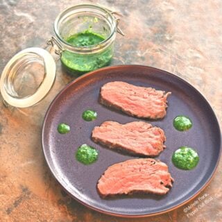 Grilled Tri-Tip Steak with Chimichurri Sauce is a delicious pairing that is typical of Argentina and Brazil. The steak is flavorful and juicy—and perfectly accented by the tangy, fresh chimichurri sauce. #tritip #tritipsteak #chimichurrisauce #argentinianfood #grilledmeat #flippedoutfood #cookoutfood #brazilianfood #parillada #healthyfood via @FlippedOutFood