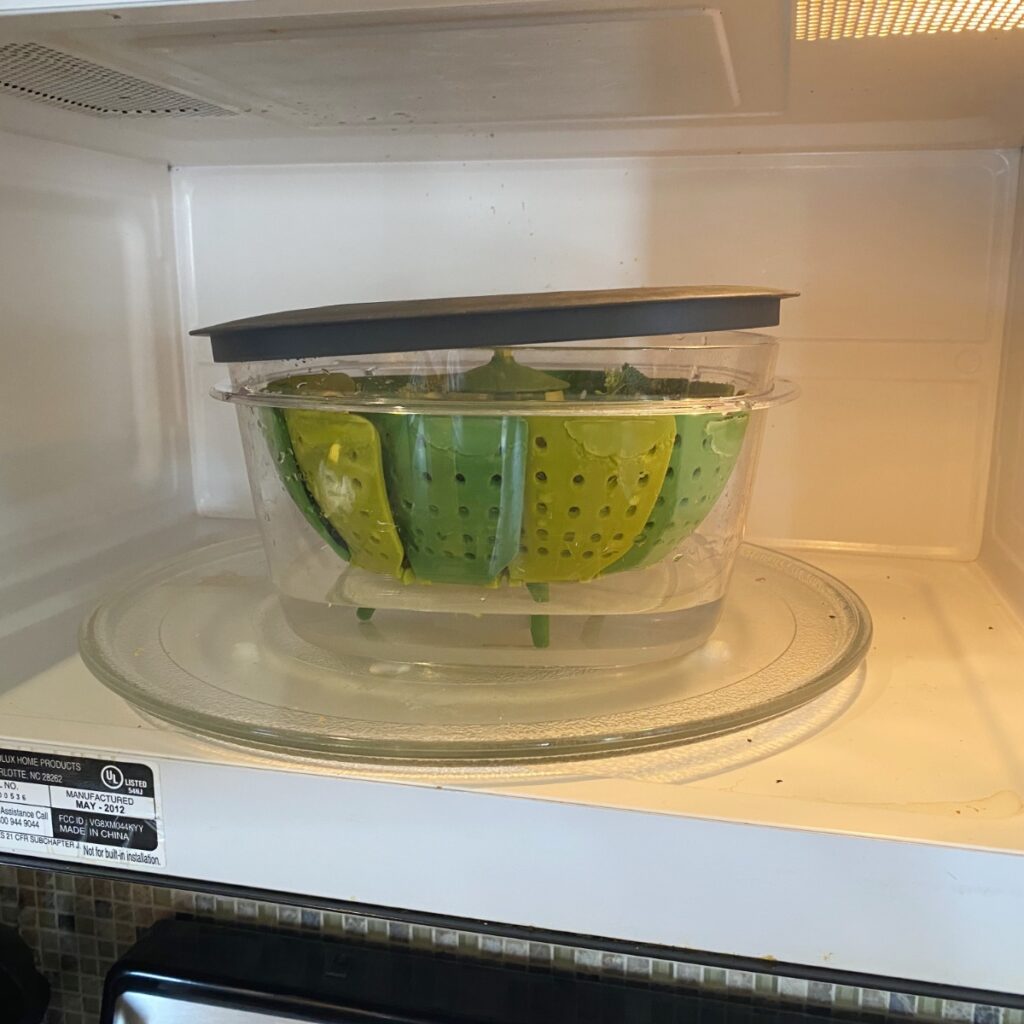 Easy Microwave Broccoli in its steamer inside the microwave