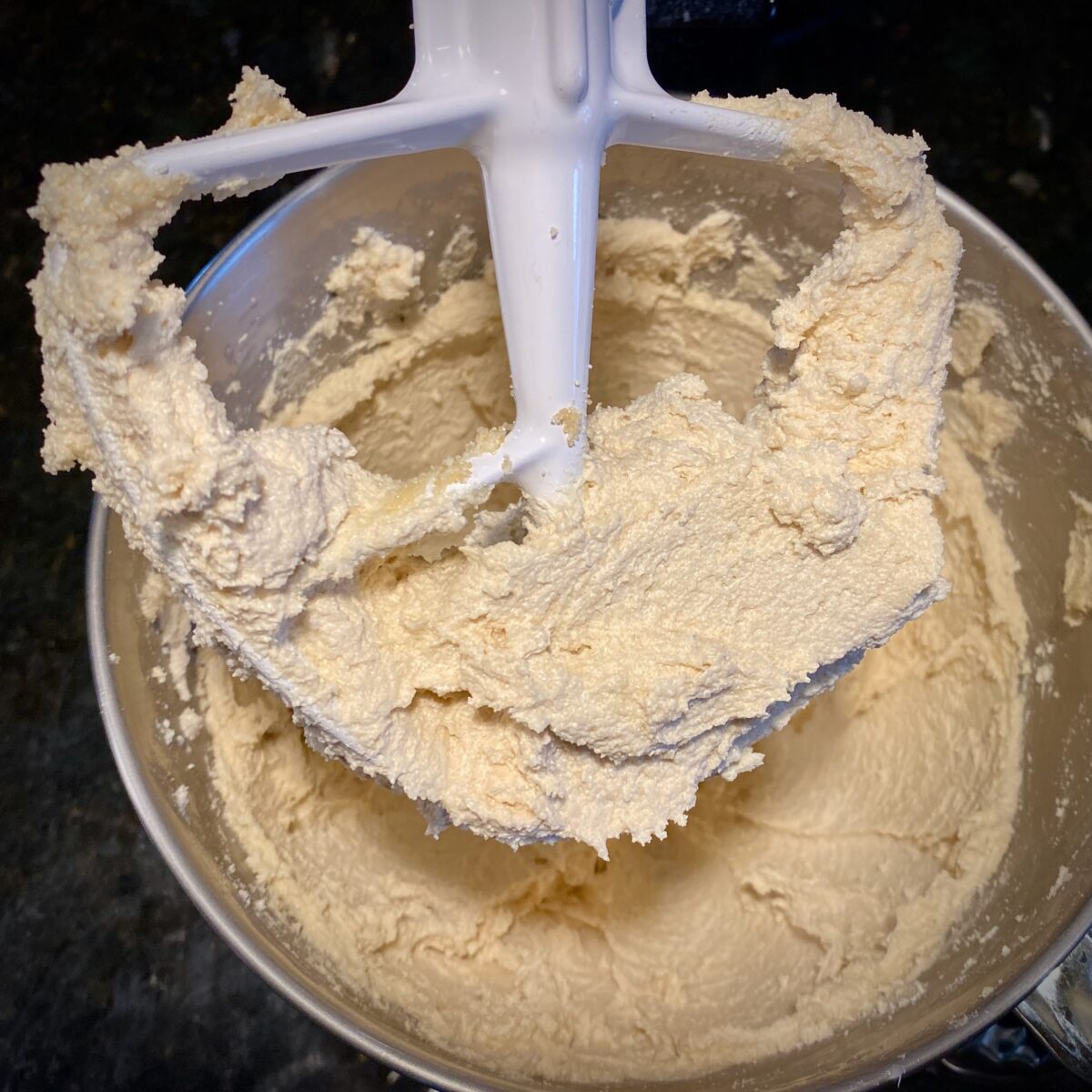 Sugars and butter in the bowl of the stand mixer after creaming together for 5 minutes.