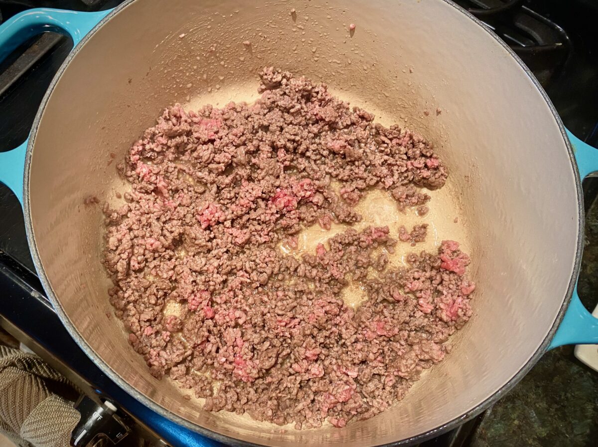Top view of ground beef that has been cooked to 75% done.