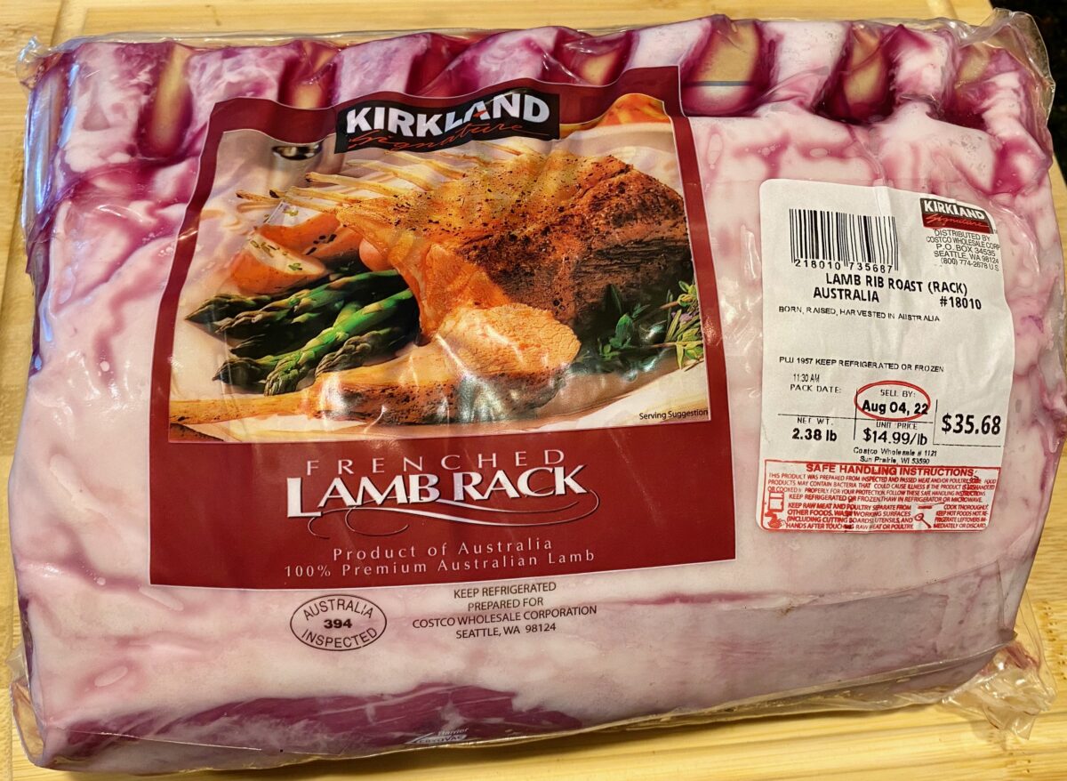 Top view of costco lamb rib roast in its packaging.