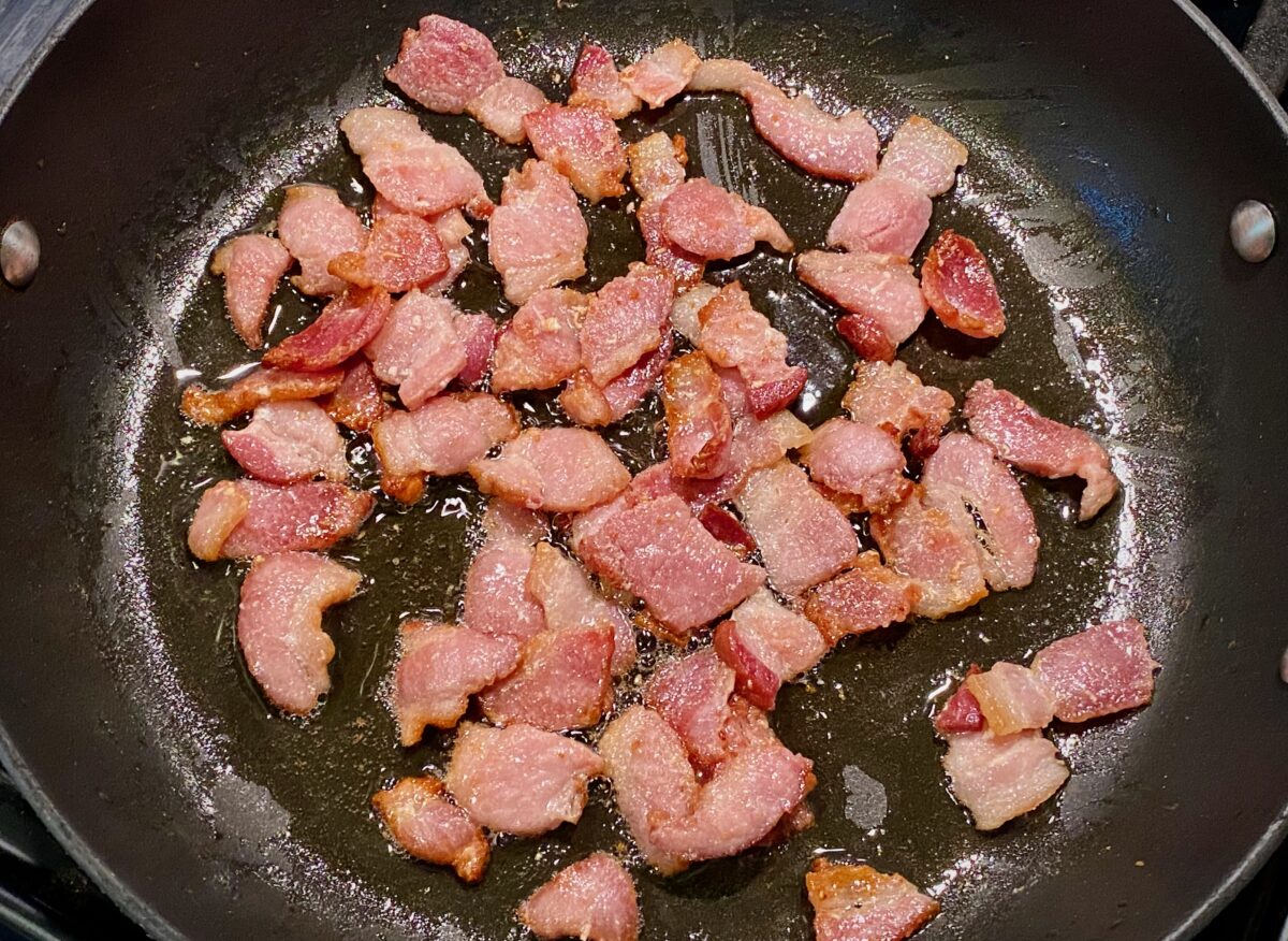 one inch pieces of bacon that have been cooked 75% of the way.