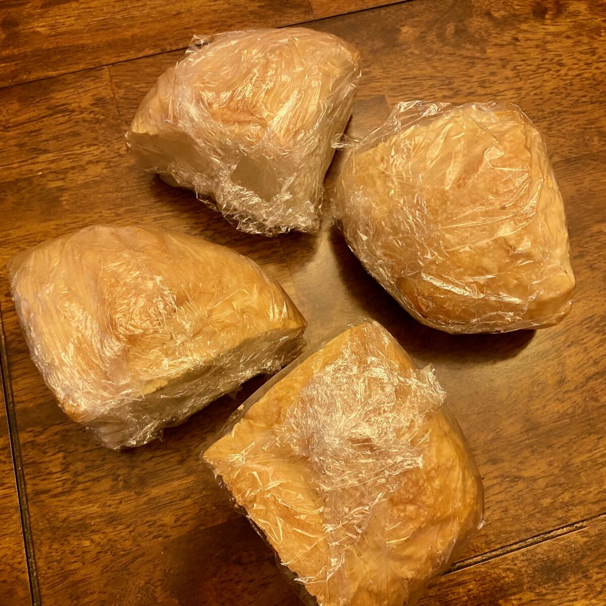 After cooling completely, the loaf has been cut into quarters and wrapped in plastic for freezing. That is, if you don't eat it all at once!